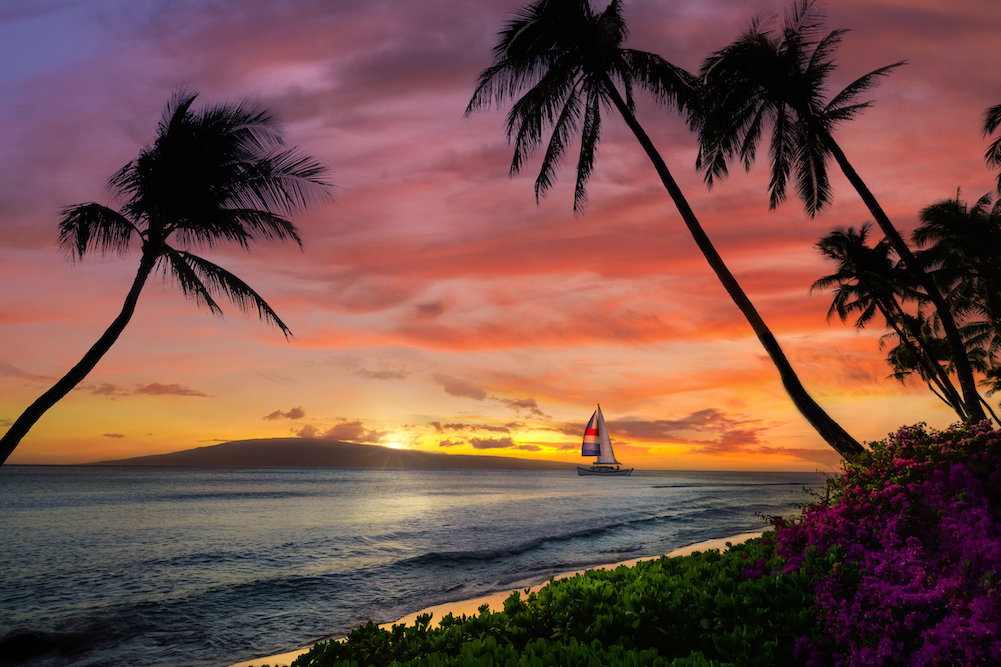 maui sunset with sailboat on water